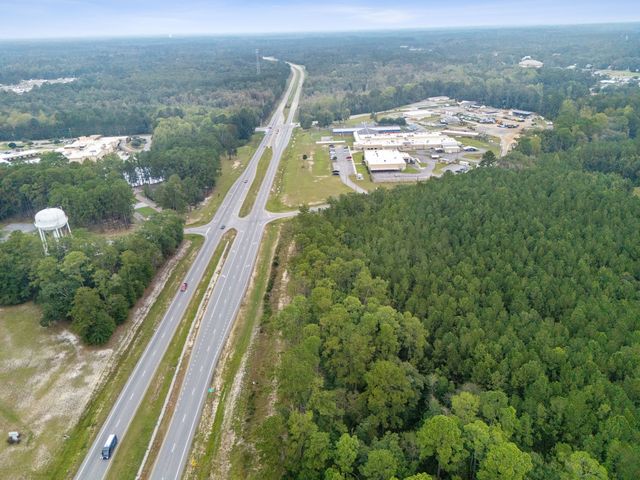 Aerial view looking north along GA Hwy 21 Bypass with the site on the right, no boundary lines shown